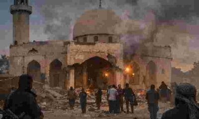 Terrorists attack mosque in Kebbi State, smoke rising from damaged building, DocuNews news graphic