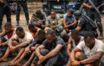 AI generated illustrations Of Edo State police crackdown scene showing arrested suspects and rescued victims.