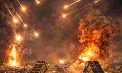 Iran missile attacks intercepted by Gulf air defense systems over Doha skyline at night