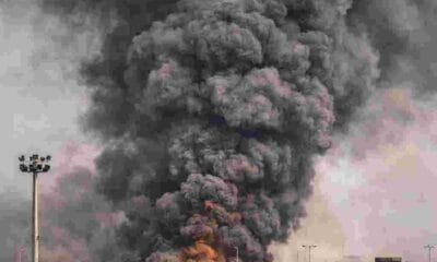 AI generated illustrations Of Attack on U.S. Base in Kuwait triggers massive smoke clouds after explosion at U.S. military installation